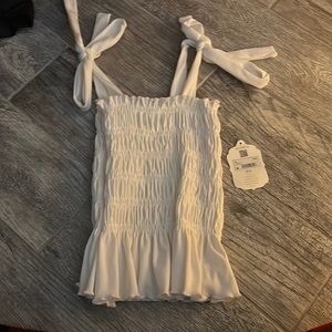 White Altrd state bow slightly cropped tank